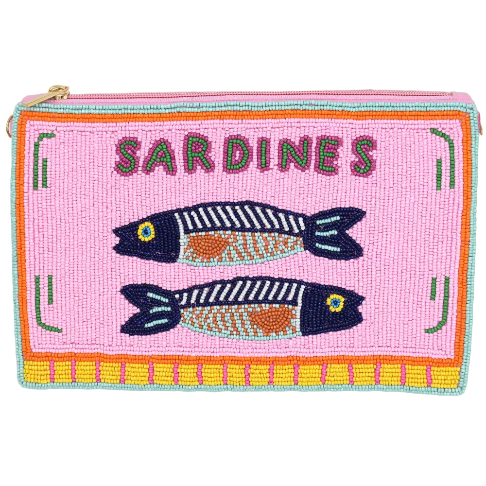 A pink woven pouch featuring two embroidered sardines and the word 'SARDINES' in green letters, with a gold zipper pull, photographed on a light surface.