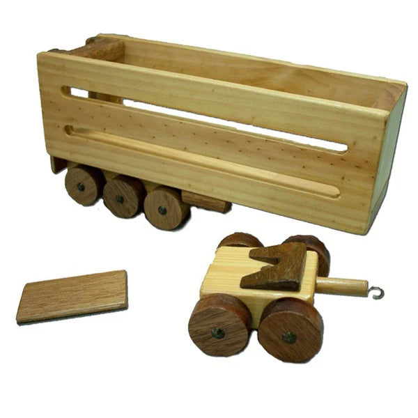 Wooden toy truck with a flatbed trailer on a white background