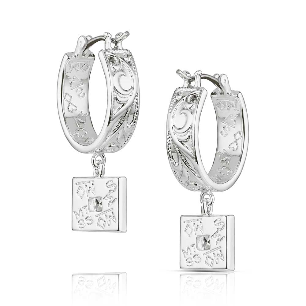 Silver hoop earrings with square charms on a white background