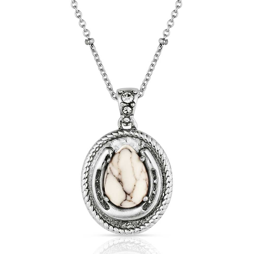 Silver necklace with a pendant featuring a white stone on a white background
