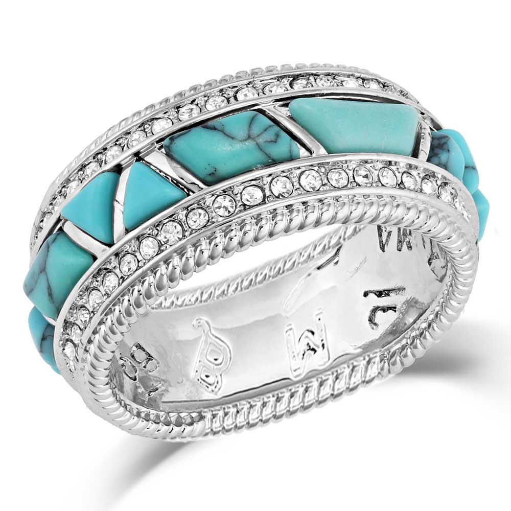 Montana Silversmiths High Noon Cobblestone Ring. A silver-colored ring with turquoise stones in a cobblestone design, accented with clear cubic zirconia crystals around the edges.