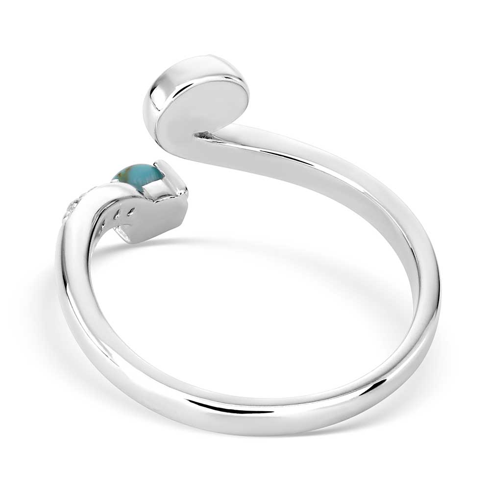 Silver ring with a blue gemstone on a white background