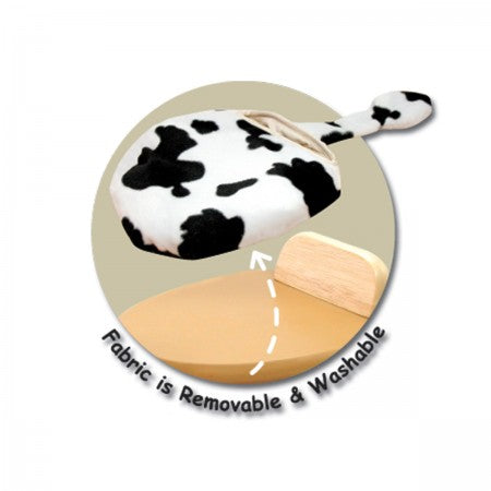 I'm Toy Paddie Rider CalfieWooden toy cow with wheels on a white background 