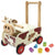 I'm Toy Walk And Ride Cow Sorter. Wooden toy cow push cart with colorful blocks on a white background