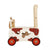 I'm Toy Walk And Ride Cow Sorter. Wooden toy cow with wheels on a white background