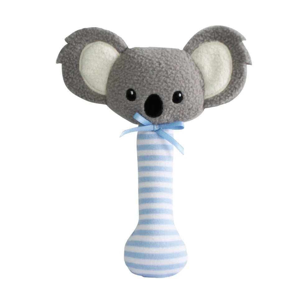 Plush koala toy with a blue and white striped rattle on a white background