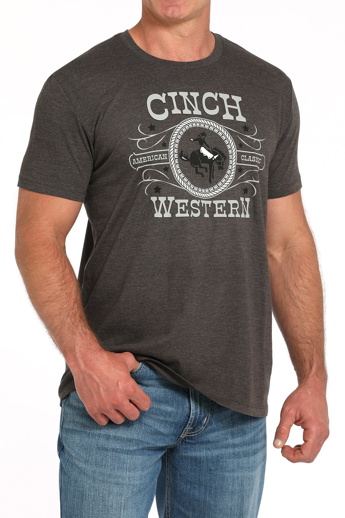 Cinch Men's Western T-Shirt. Man wearing a Cinch Western t-shirt with a graphic design on a plain background