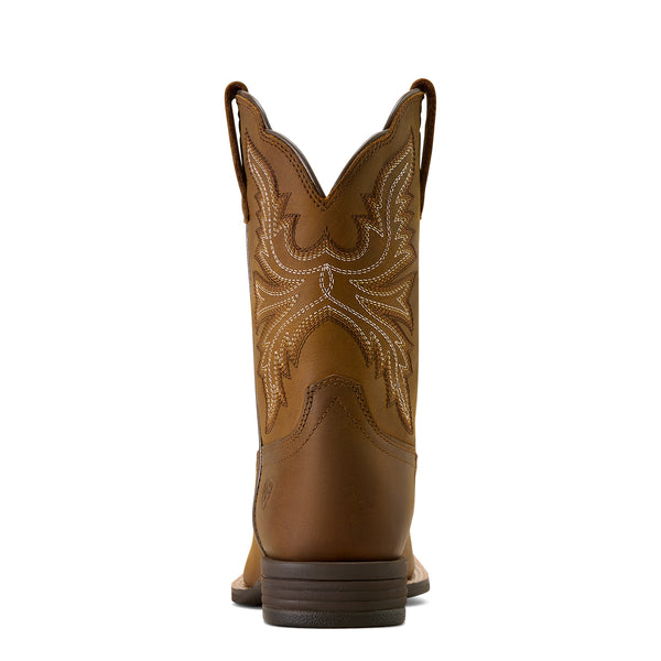 Brown cowboy boot with intricate stitching on a white background