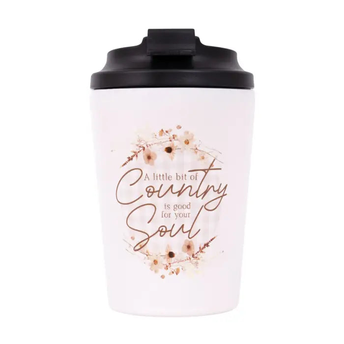 A white insulated travel mug with a black lid, featuring a brown floral wreath design and the text 'A little bit of Country is good for your Soul' on the front, set against a plain white background.