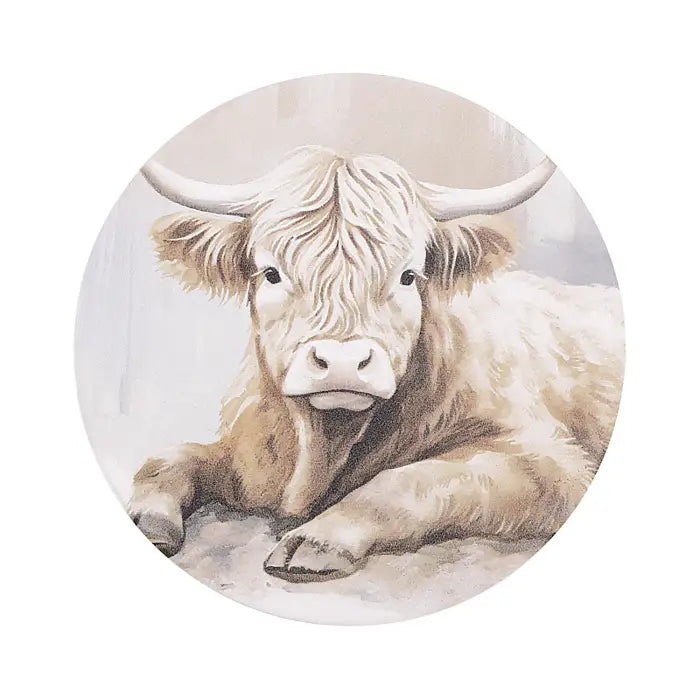 A circular art print featuring a detailed painting of a highland cow with long horns resting on a neutral, light background.
