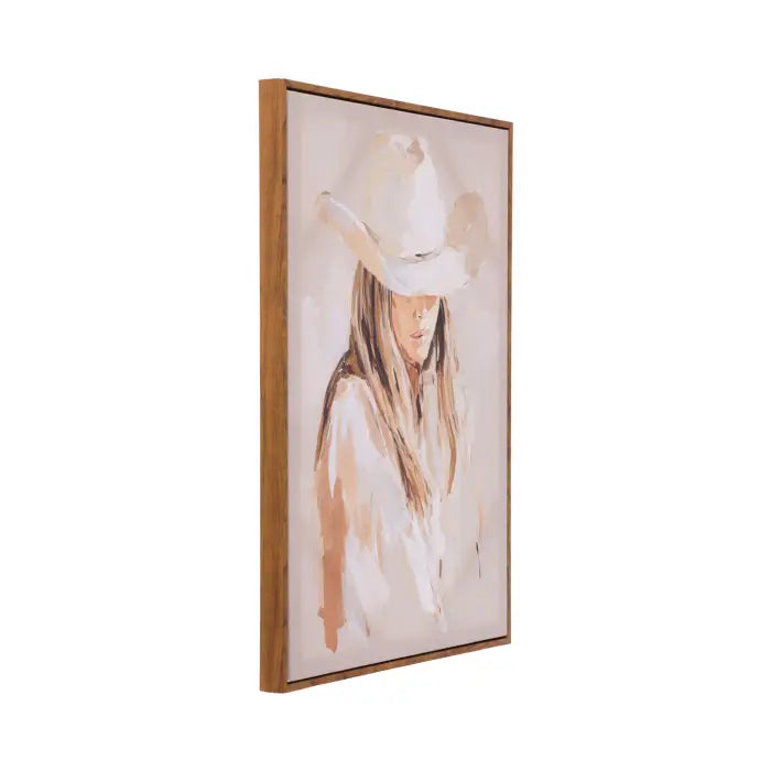 A framed vertical canvas print featuring a western-style portrait painting of a woman in a white cowboy hat, shown at an angle against a plain white background.