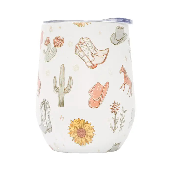 A white stemless wine tumbler with a western-themed print featuring cacti, cowboy boots, hats, a horse, and a sunflower, shown on a plain white background.