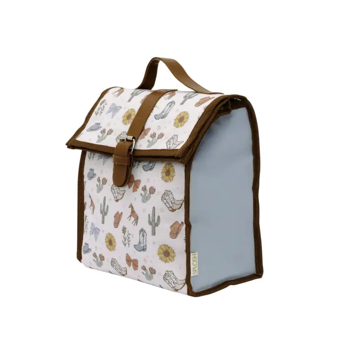 A rectangular lunch bag with a flap top, brown handle, and brown trim, featuring a white printed front panel with desert-themed illustrations and a pale blue interior side panel.