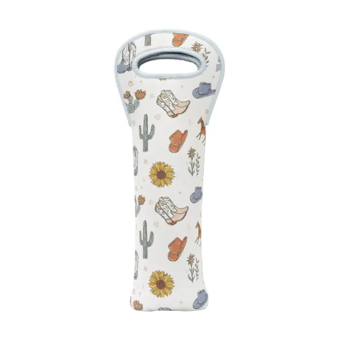 A white padded baby teething ring or soft toy with a western-themed print featuring cowboy boots, cacti, sunflowers, and hats, shown on a plain white background.