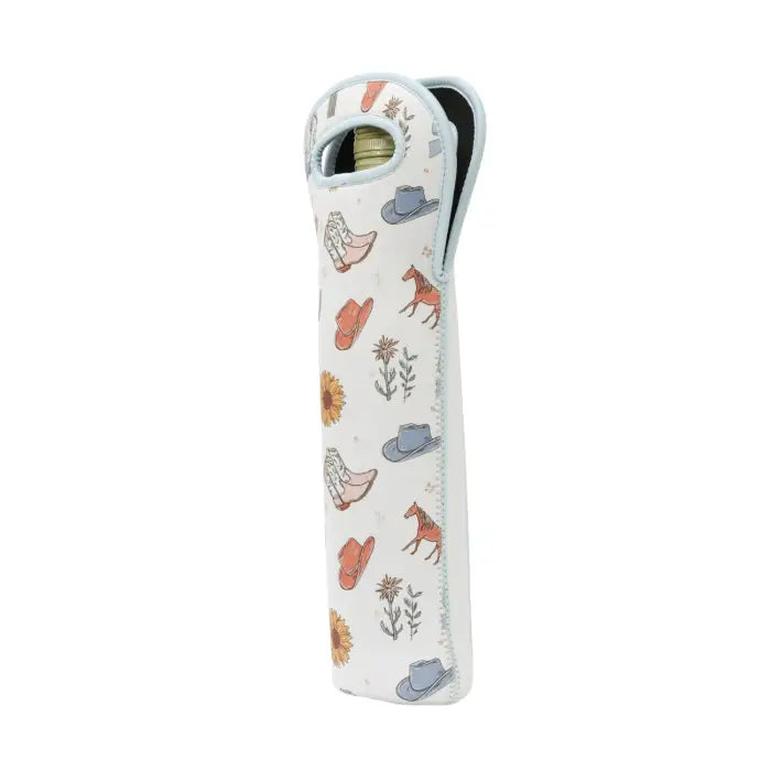 A white neoprene toothbrush case with a western-themed print featuring cowboy boots, hats, a horse, and flowers, shown on a plain white background.