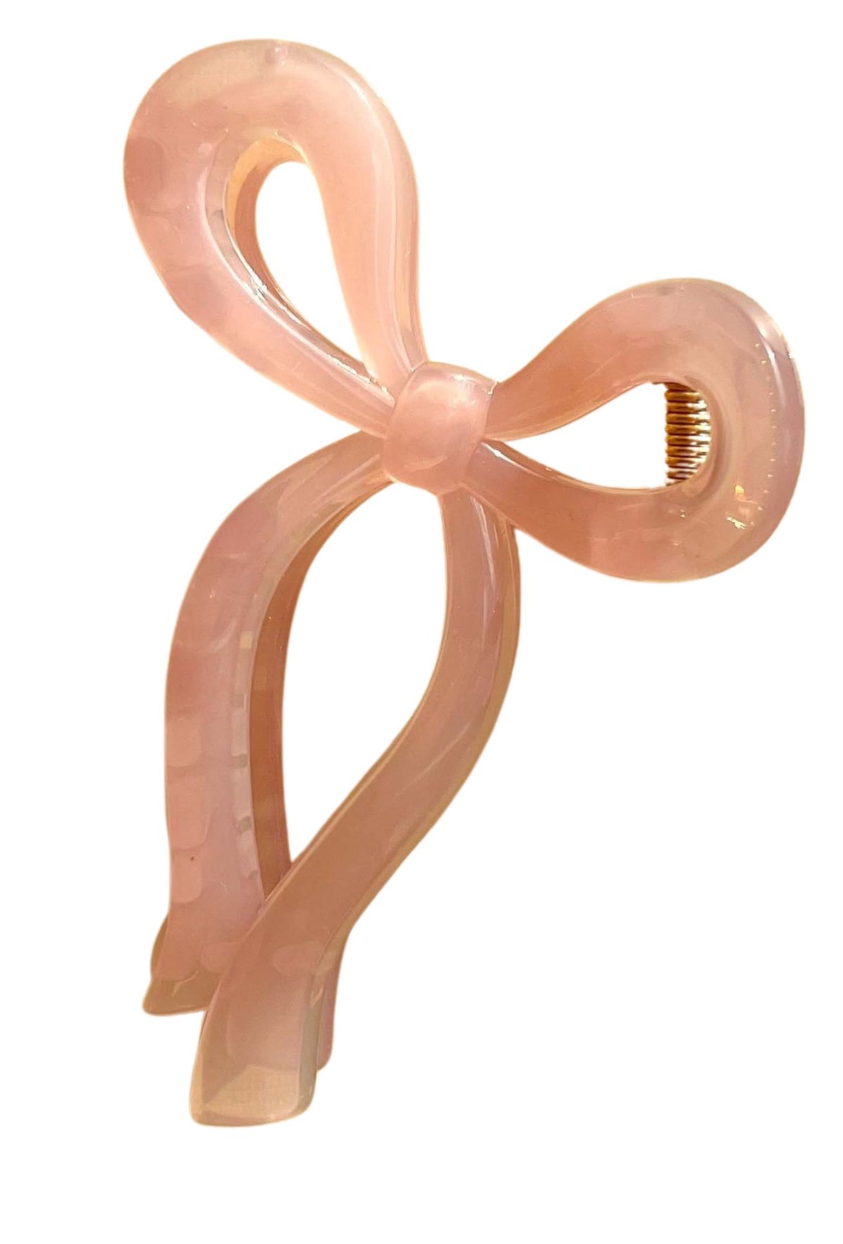 Pink bow-shaped hair clip on a white background