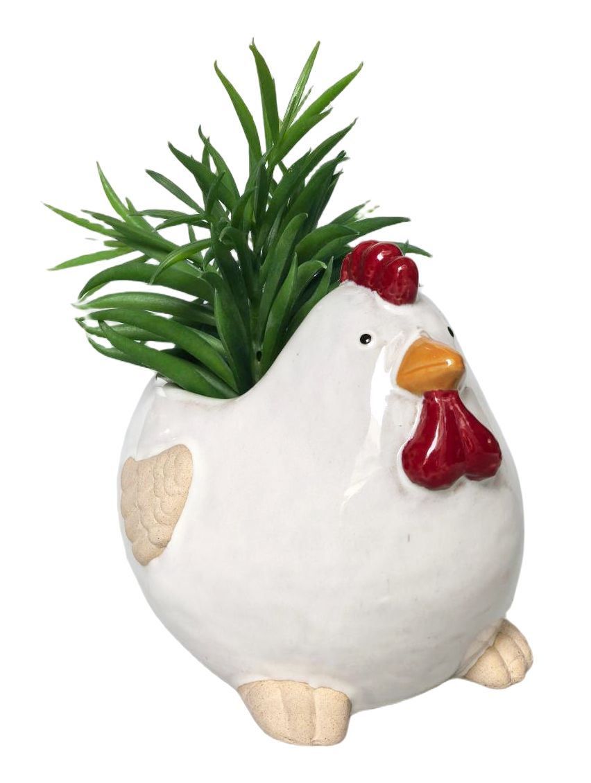 A white ceramic chicken-shaped planter with a red comb and wattle, orange beak, and beige feet, holding a green artificial plant against a white background.