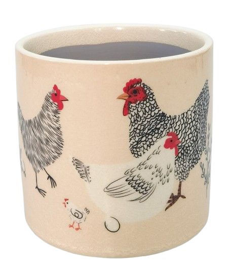 Ceramic planter with chicken design on a beige background