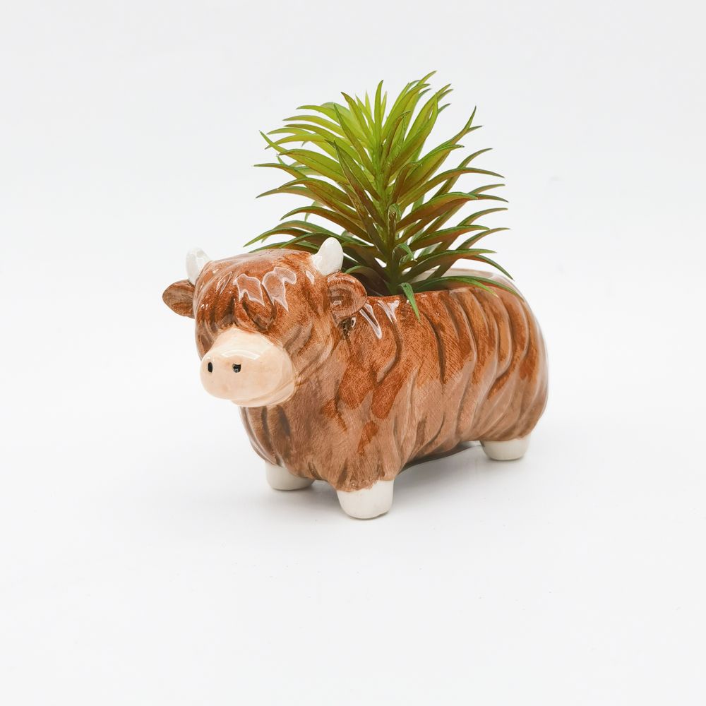 Urban Products 14cm Higland Planter. Ceramic bull-shaped planter on a white background