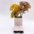 Urban Products 16cm Pink Cowboy Boots Planter. Pink ceramic cowboy boot with brown soles on a white background