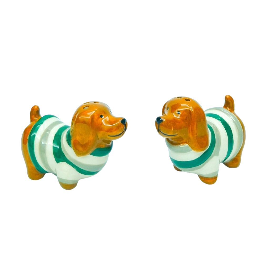 A pair of ceramic dachshund salt and pepper shakers with orange-brown bodies and green and white striped sweaters, shown on a plain white background.