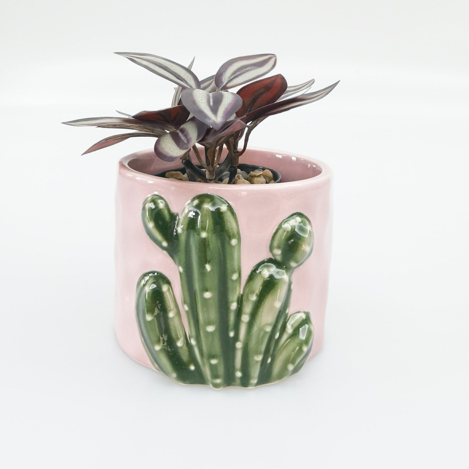 Urban Products 9cm Cactus Planter. Pink ceramic pot with green cactus design on a white background