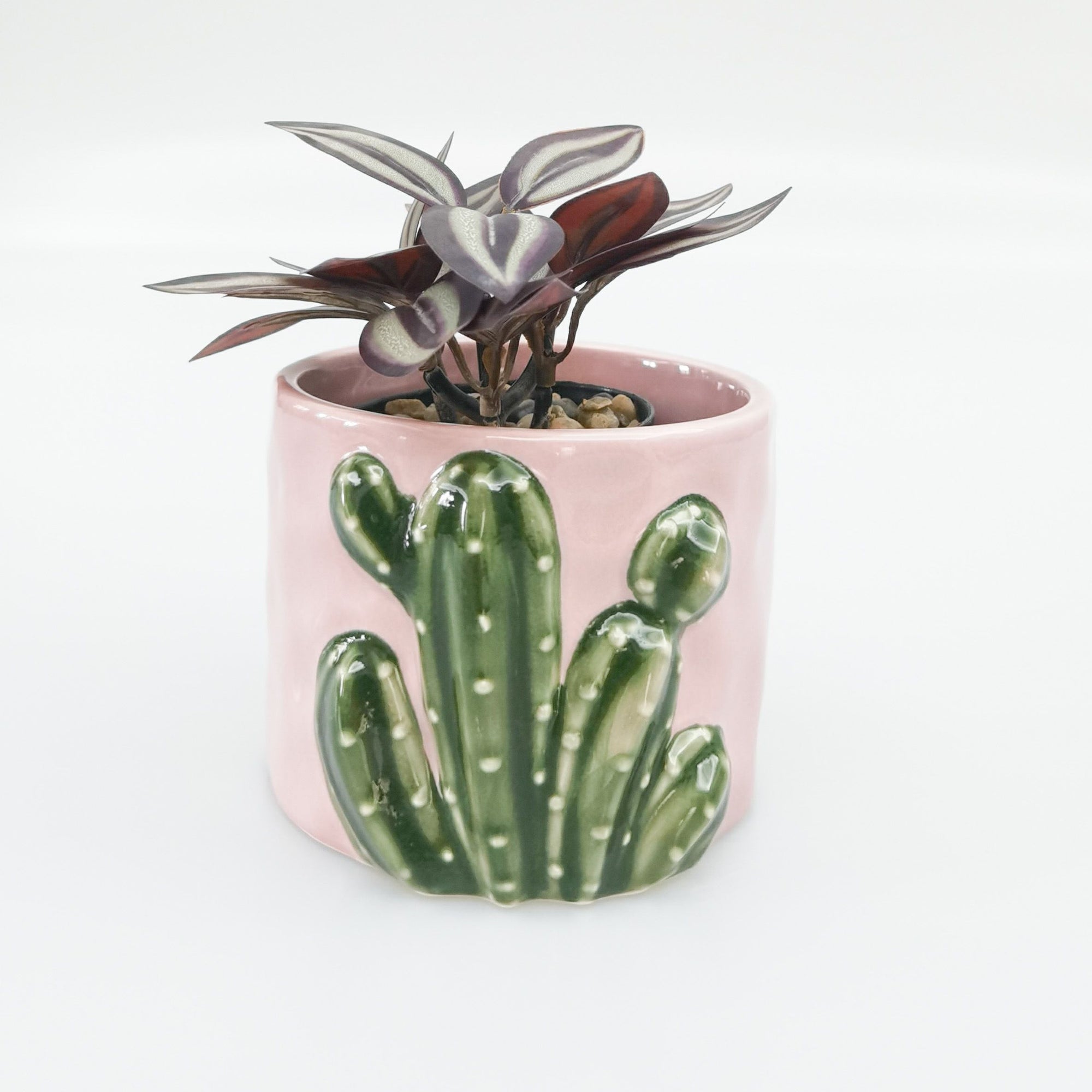 Urban Products 9cm Cactus Planter. Pink ceramic pot with green cactus design on a white background
