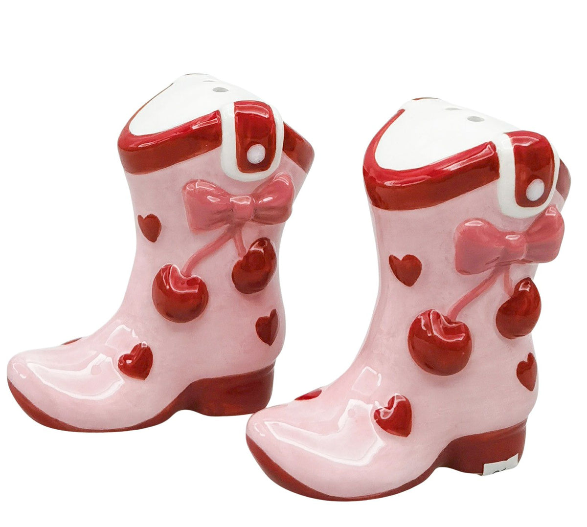 Urban Products 7cm Cherry Boot Salt &amp; Pepper Shaker. Pink ceramic boots with red cherries and bows on a white background