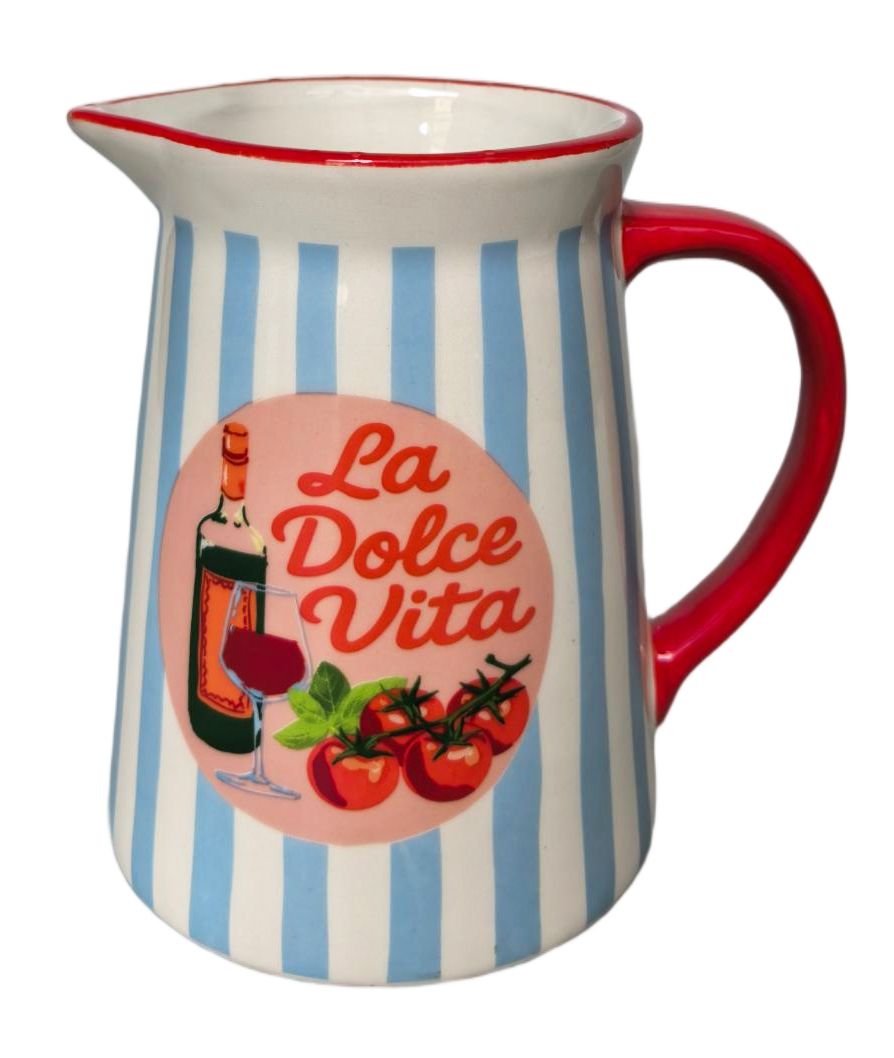A ceramic pitcher with vertical light blue and white stripes, a red handle, and a red rim. The front features a circular pink graphic with the text 'La Dolce Vita' and an illustration of a wine bottle, glass, tomatoes, and basil.