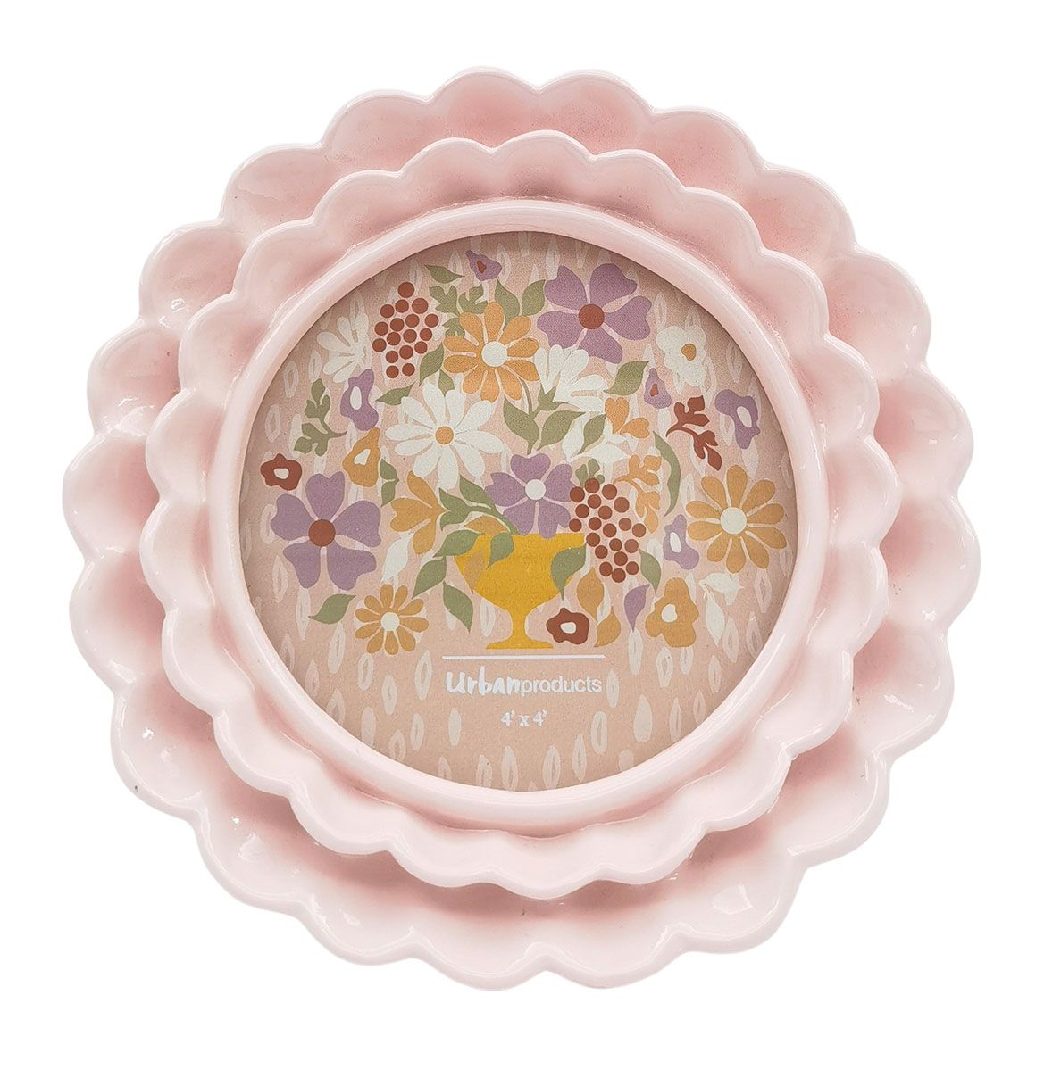 Urban Products Lotti Petal 4x4 Photo Frame. Pink decorative plate with floral design and &#39;urbanoutfitters&#39; branding on a white background