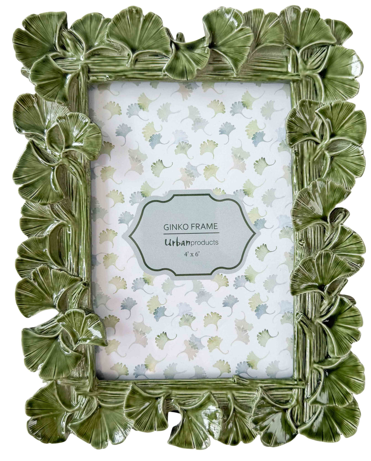 Green leaf-patterned picture frame with a white background