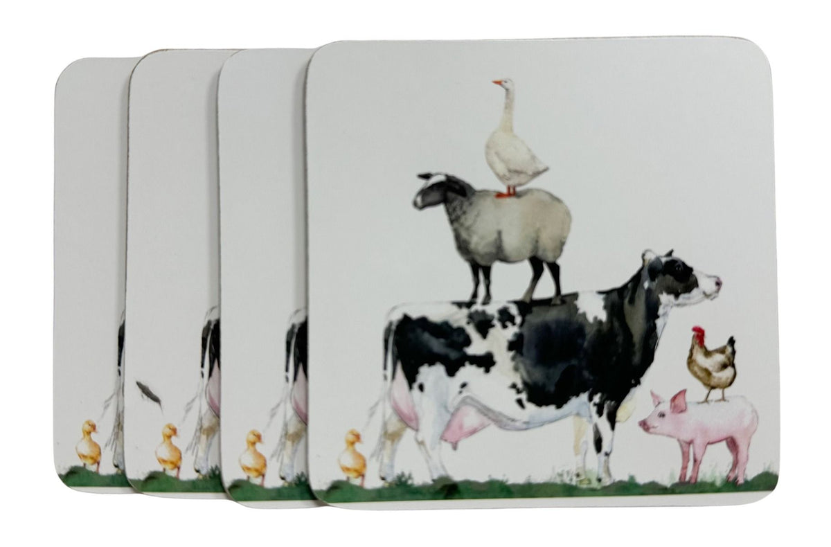 Four square coasters with rounded corners, fanned out to show the printed design. The artwork features a black-and-white cow, a white goose on its back, a sheep on the goose's back, a chicken, a pig, and small yellow ducks on a green grassy ground, all on a white background.