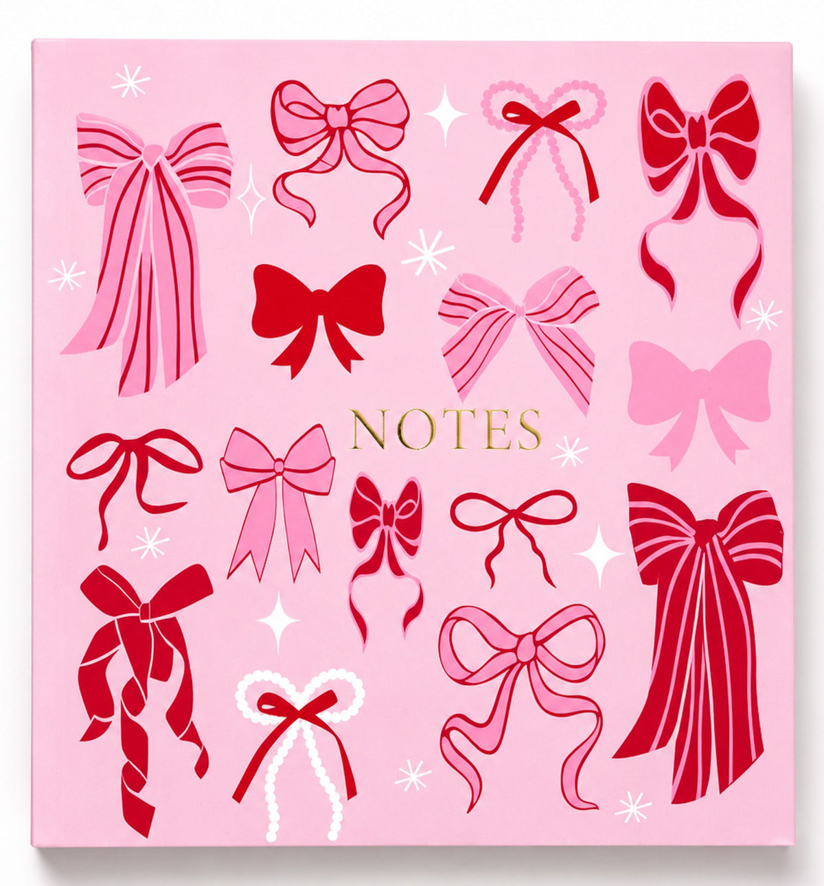 A pink square notebook cover decorated with various red and pink ribbon illustrations, white starbursts, and the word 'NOTES' in gold lettering in the center.